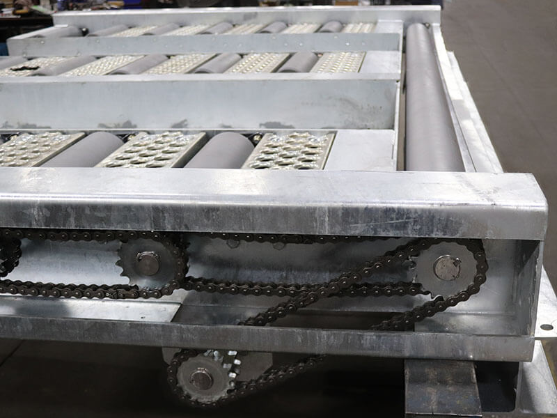 Chain-driven live roller conveyor system built by Webb-Stiles Company