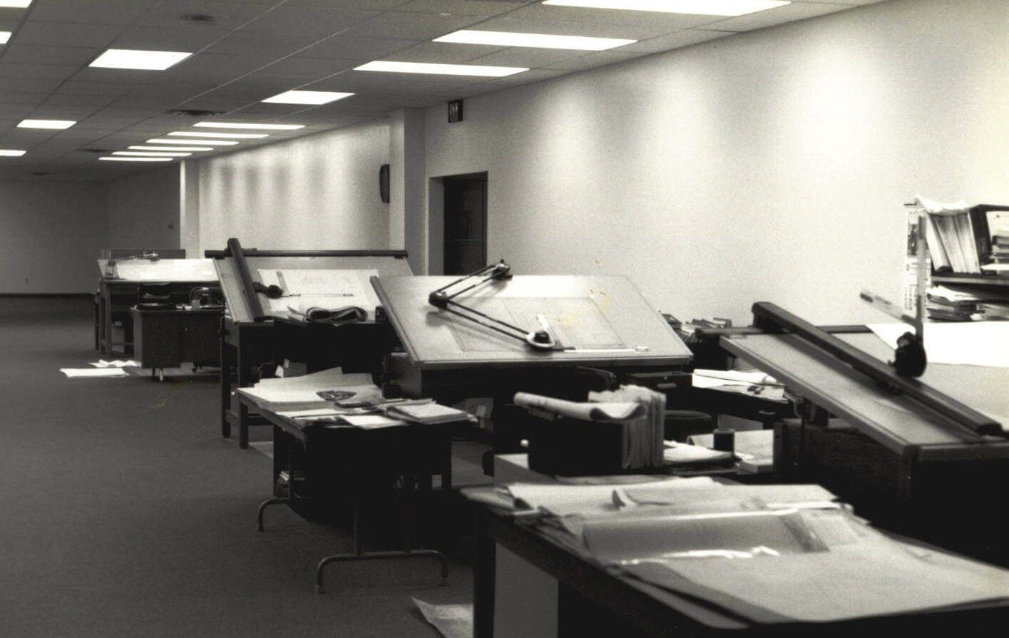 Row of manual drafting desks at Webb-Stiles before transitioning to AutoCAD 