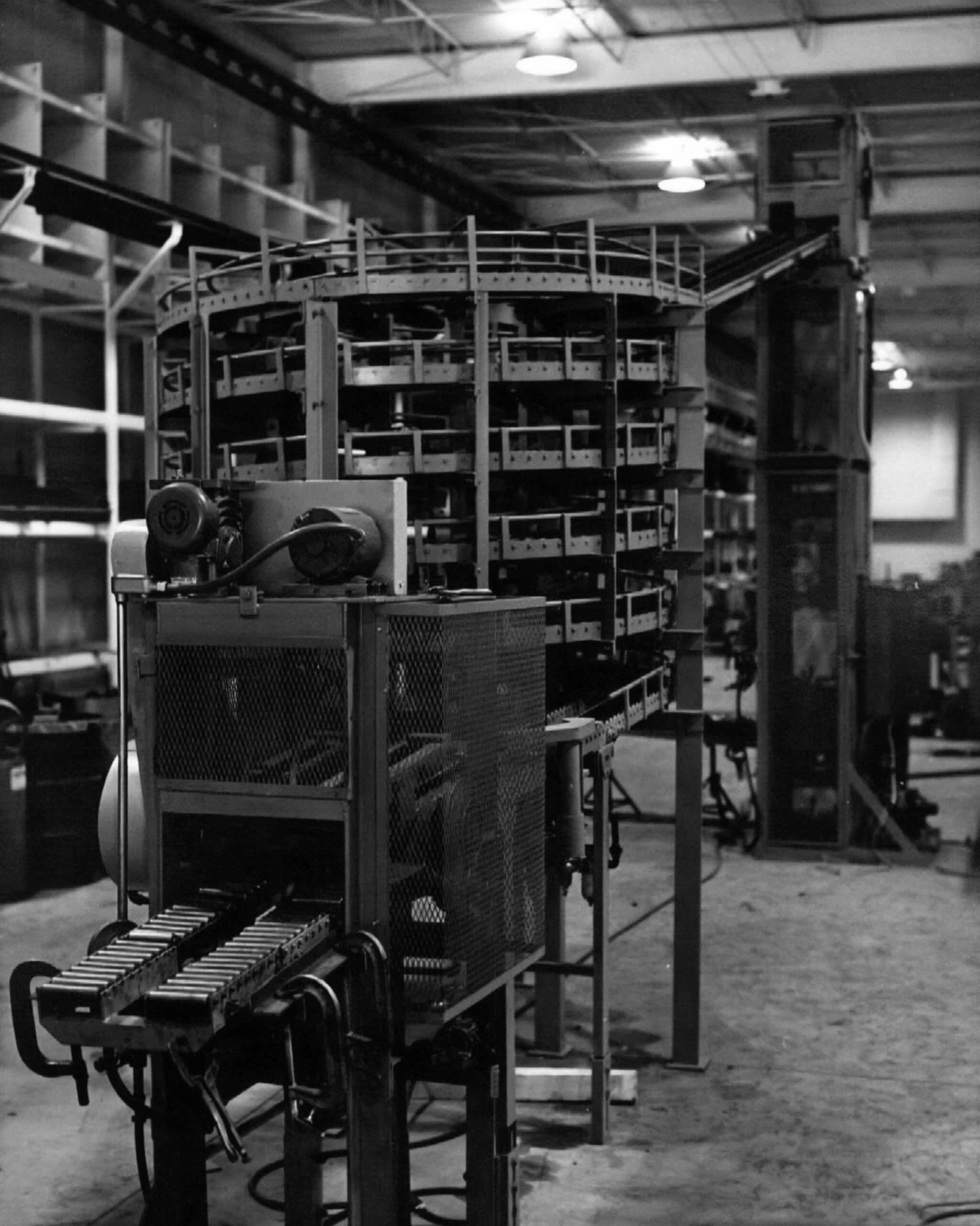 Webb-Stiles Historical Conveyor System Setup Historical Webb-Stiles conveyor setup showcasing early industrial machinery used in material handling systems.