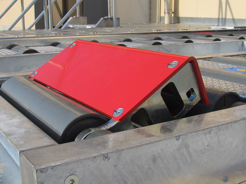 Pop-Up Stop – 463L Pallet Cargo Handling System Pop-up stop mechanism from a 463L pallet cargo handling system used for securing and staging palletized air cargo