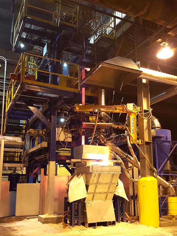 Vertical casting tube handling system with molten metal crucible and multi-level support structure