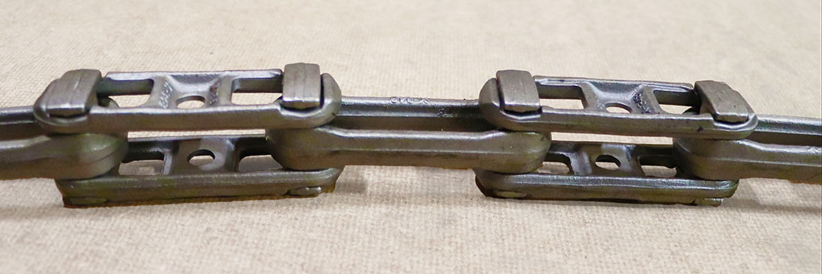 Drop forged rivetless overhead conveyor chain in high-carbon steel design